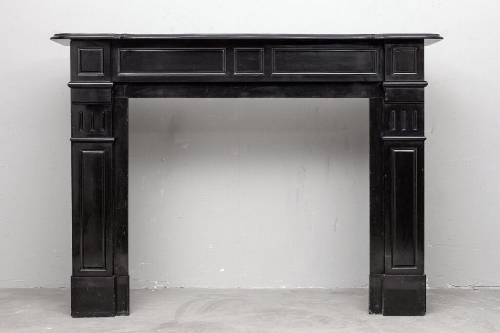 Set of two identical black marble fireplaces