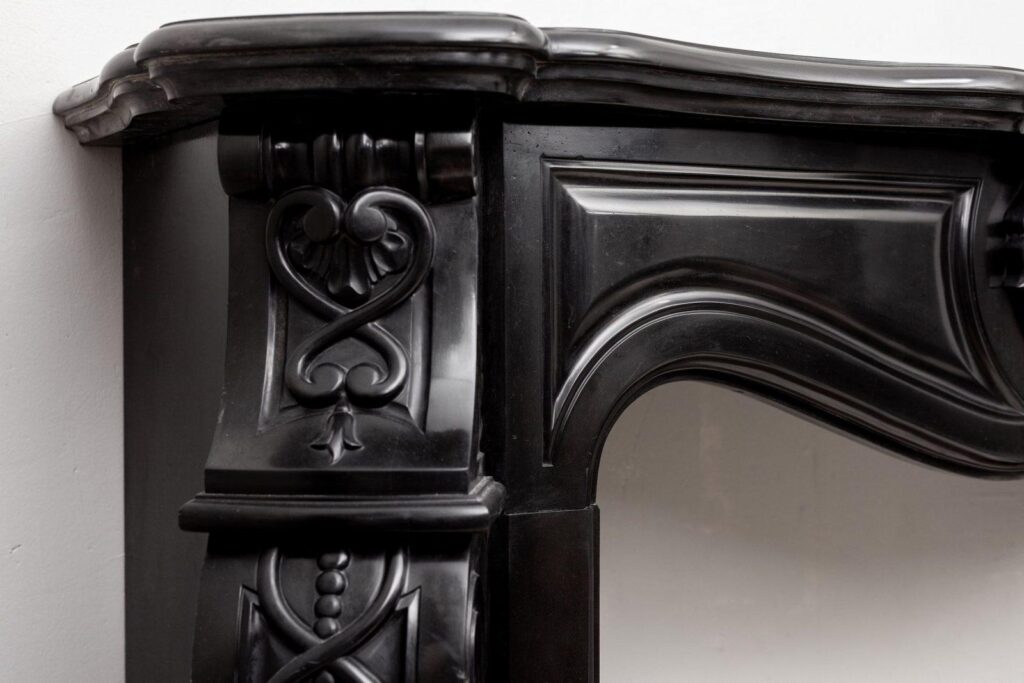 LOUIS XV STYLE NOIR DE MAZY ANTIQUE FIREPLACE