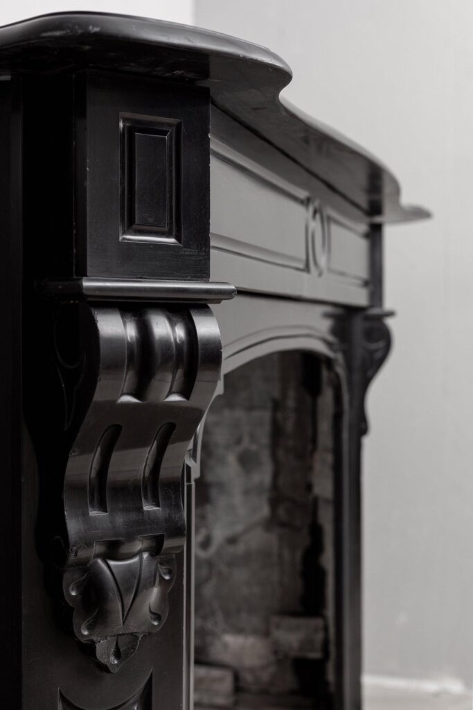 BLACK MARBLE ANTIQUE FIREPLACE