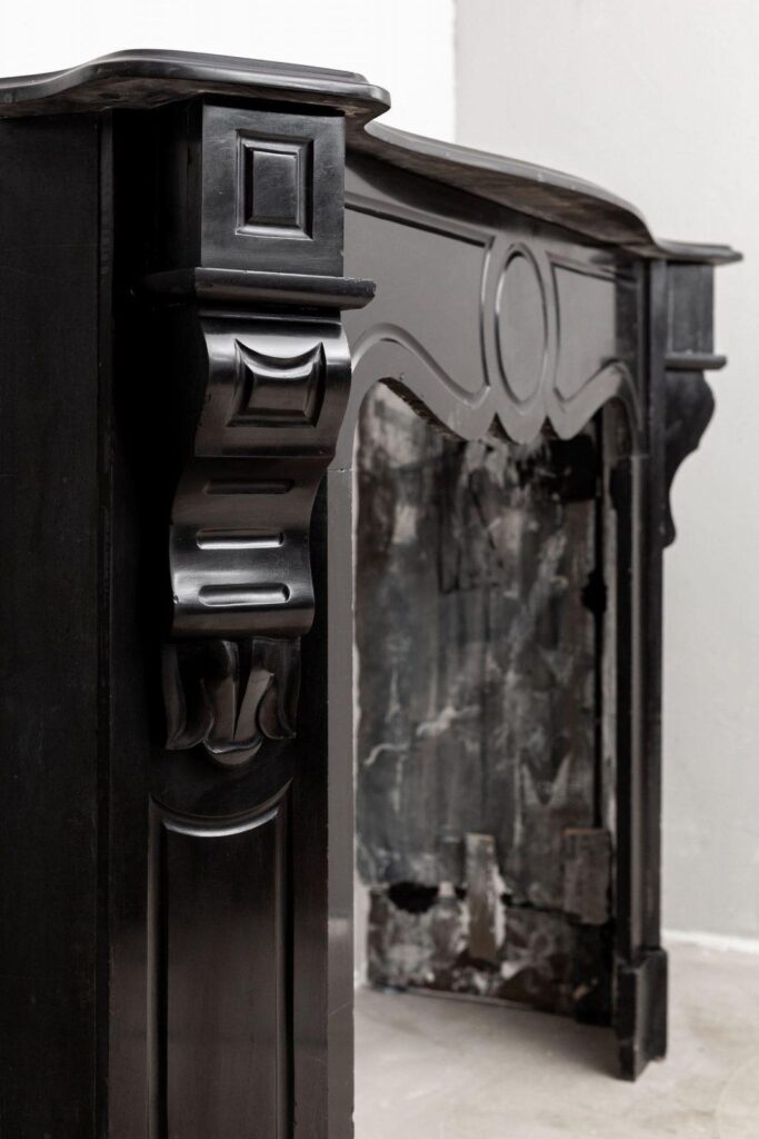 BLACK MARBLE ANTIQUE FIREPLACE