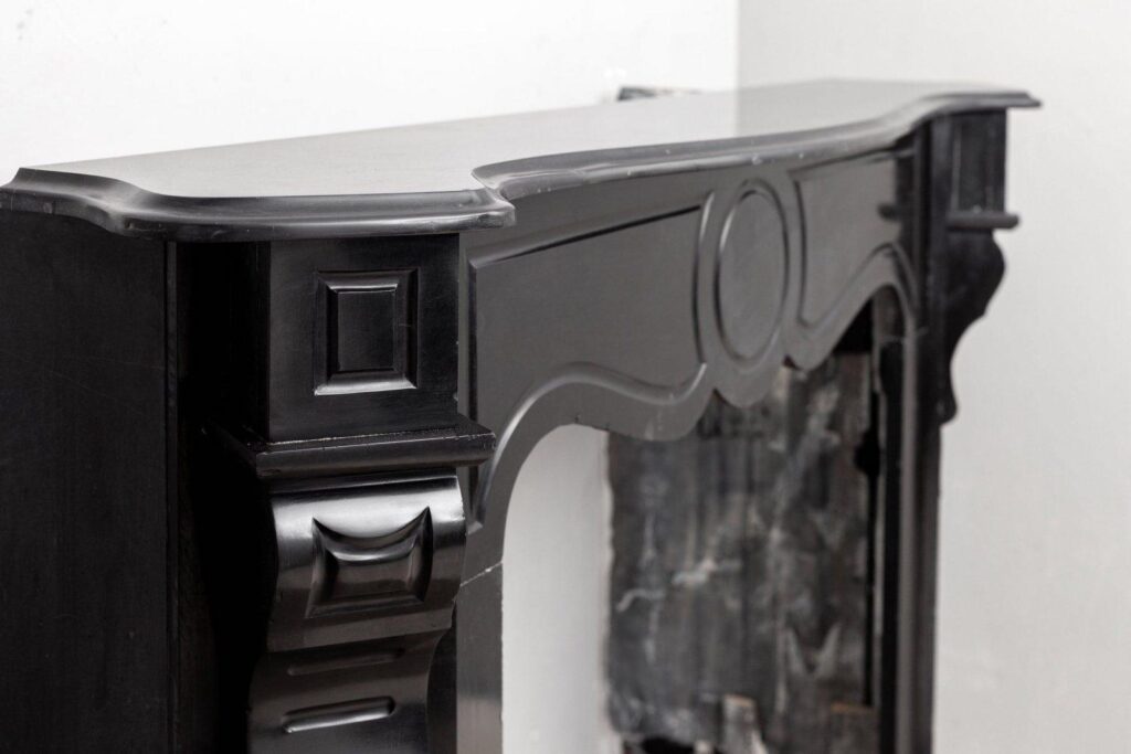 BLACK MARBLE ANTIQUE FIREPLACE