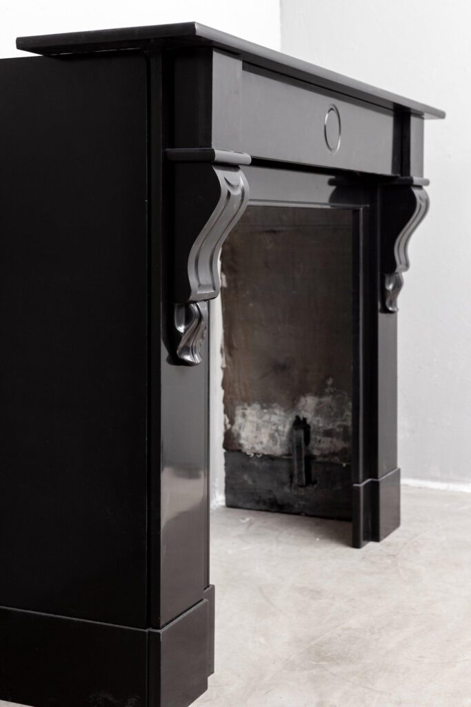 BLACK MARBLE ANTIQUE FIREPLACE