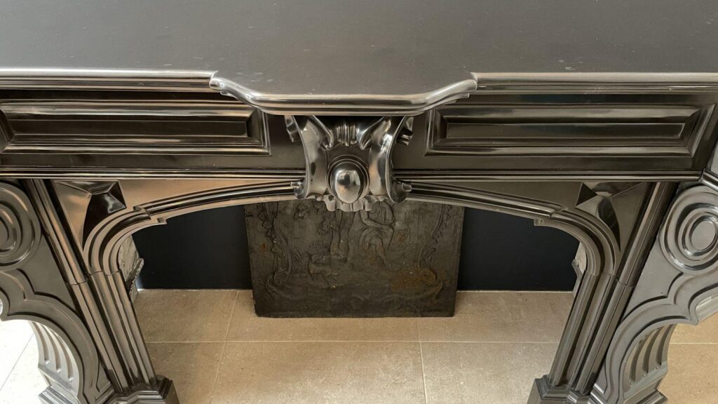 Beautiful Louis XVI Noir de Mazy Antique Circulation Fireplace