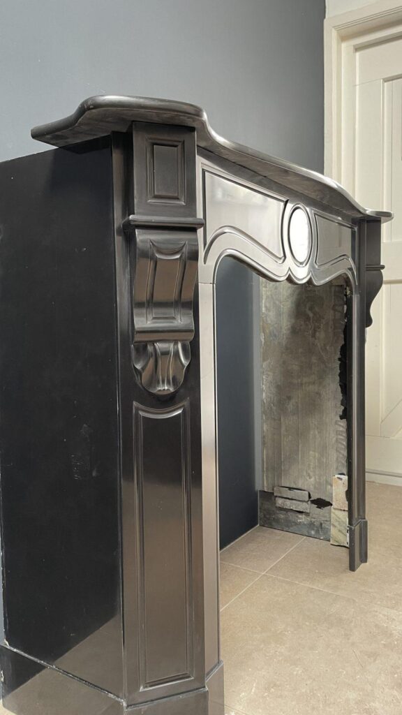 Antique Black Louis XV Marble Circulation Fireplace