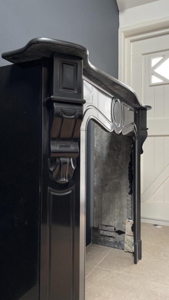 Antique Black Louis XV Marble Circulation Fireplace