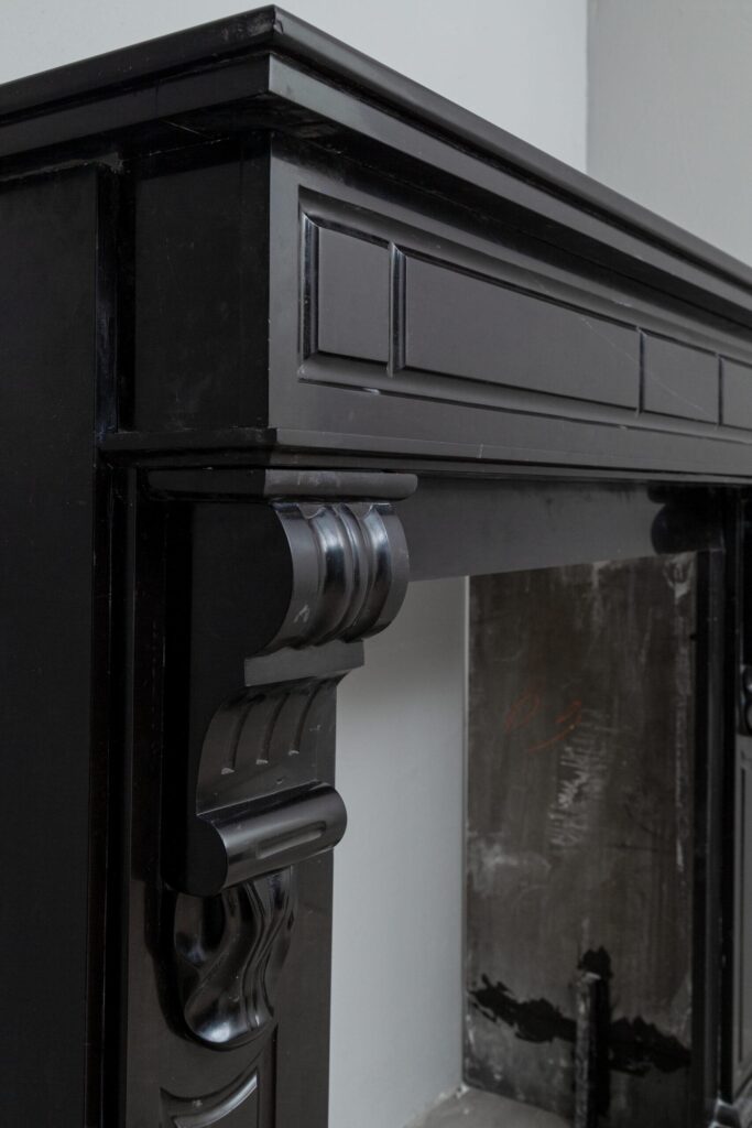 BLACK MARBLE ANTIQUE FIREPLACE