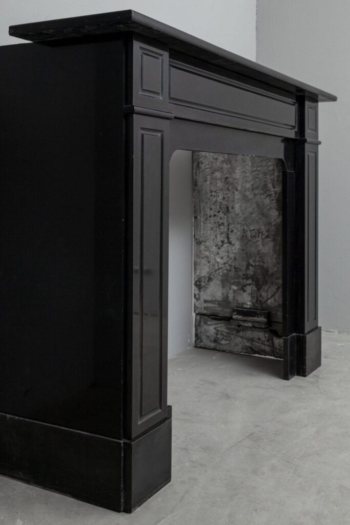 BLACK MARBLE ANTIQUE FIREPLACE