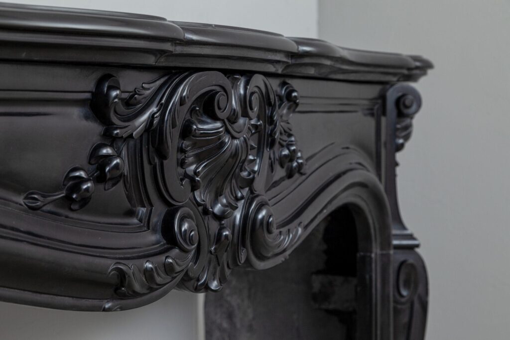 LOUIS XV STYLE NOIR DE MAZY ANTIQUE FIREPLACE SURROUND