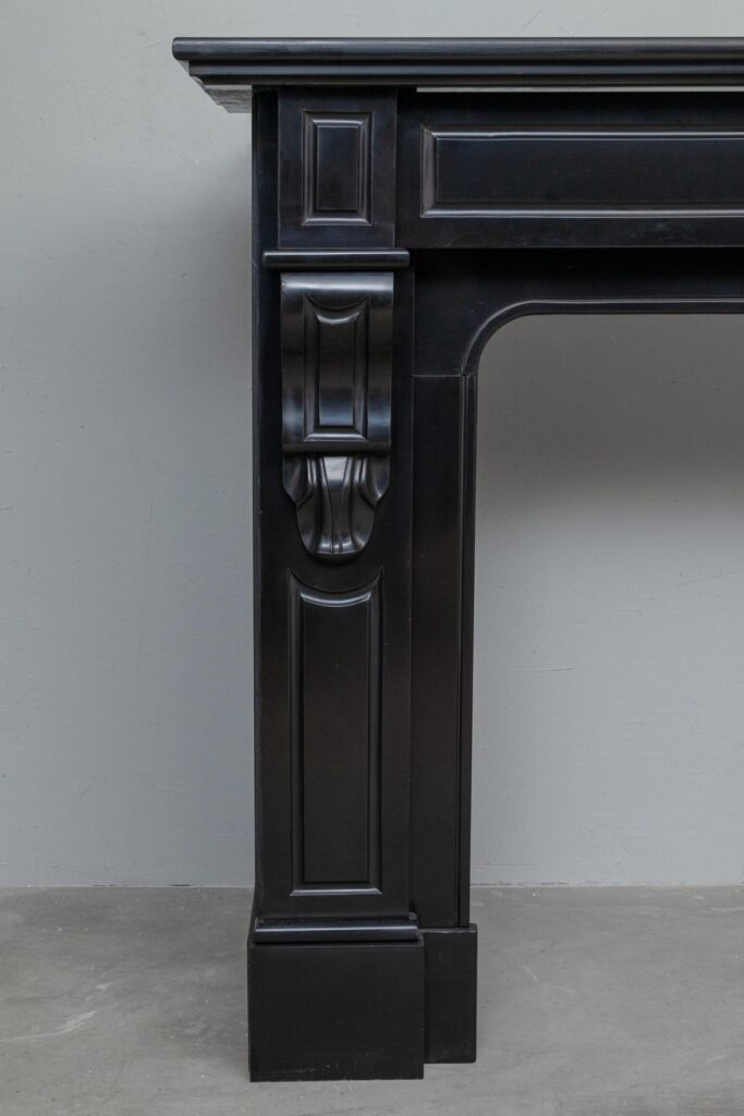Set of two identical black marble fireplaces