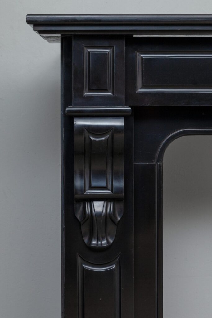 Set of two identical black marble fireplaces