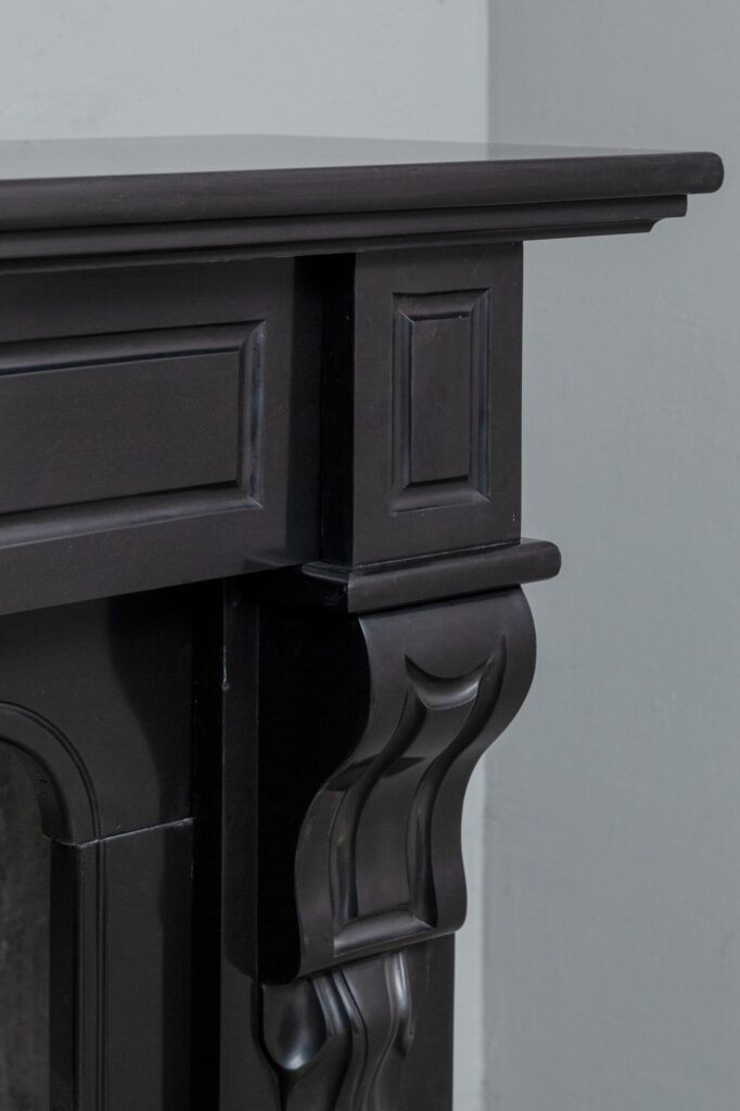 Set of two identical black marble fireplaces