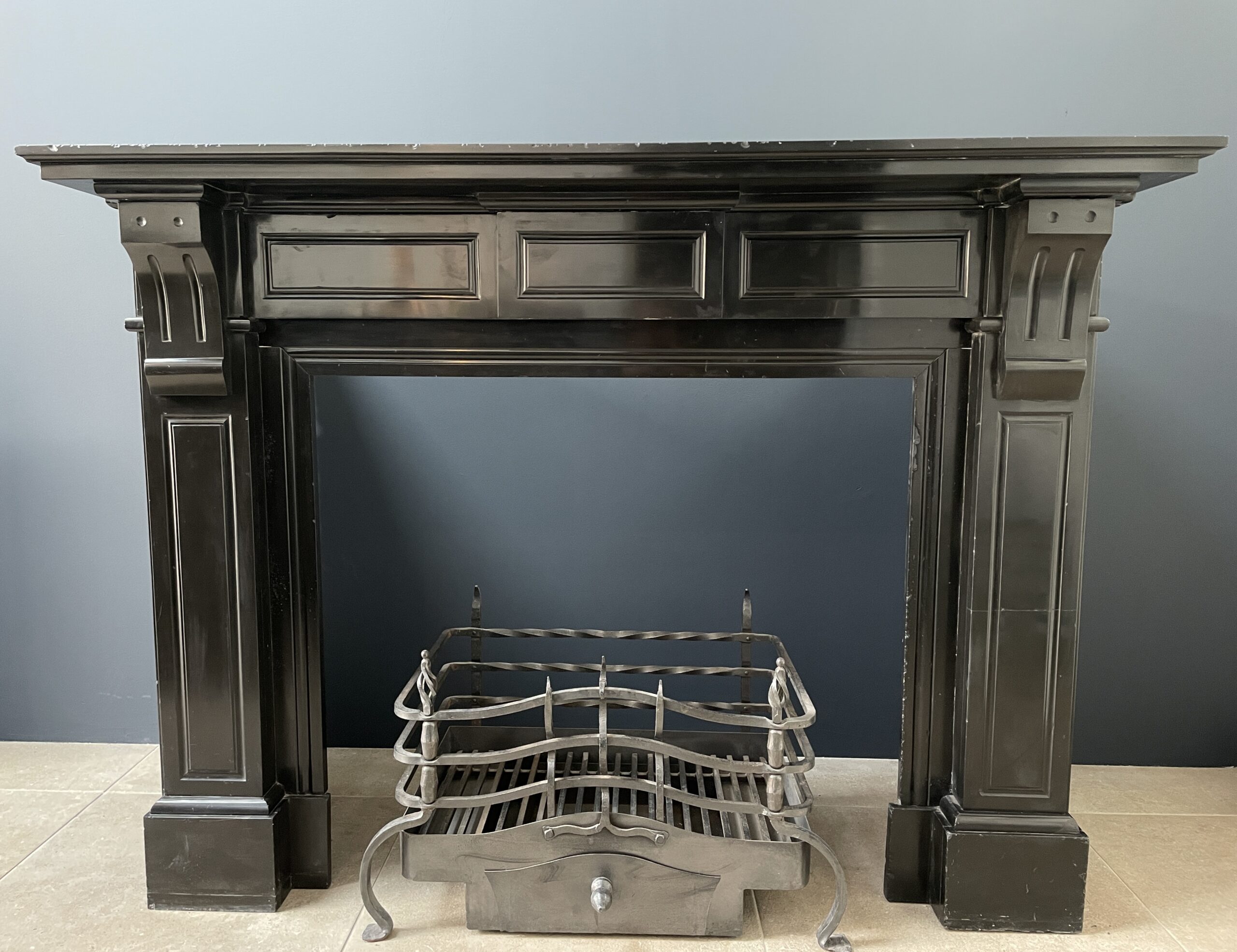 Set of Two Identical Black Marble Circular Fireplaces