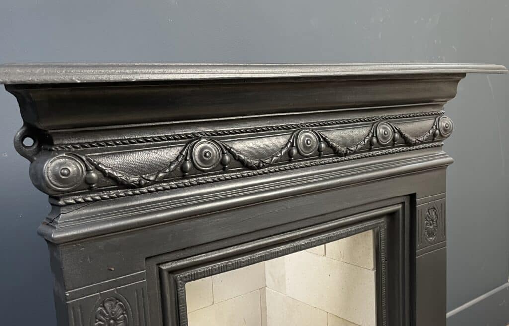 Antique English Cast-Iron Fireplace