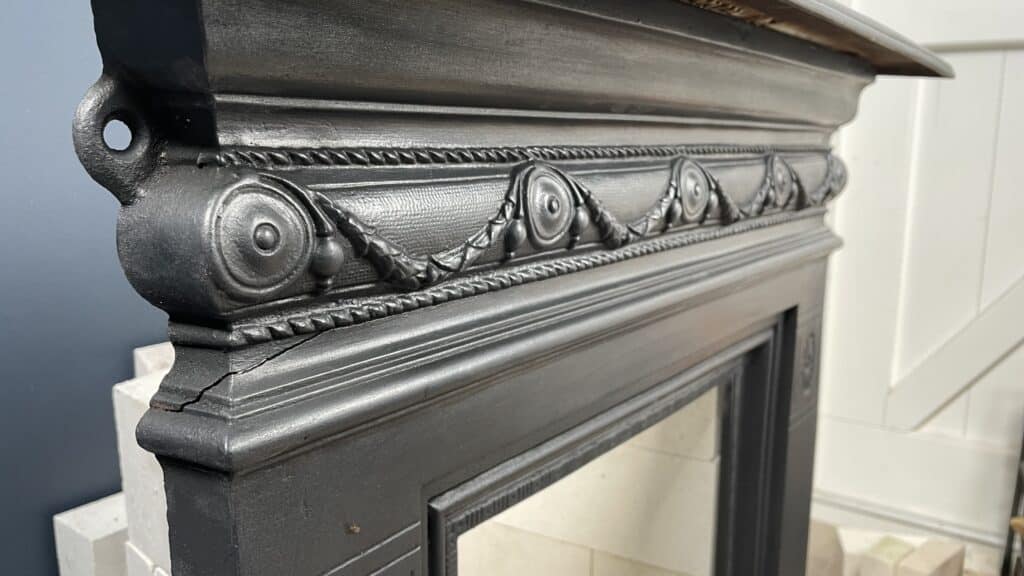 Antique English Cast-Iron Fireplace