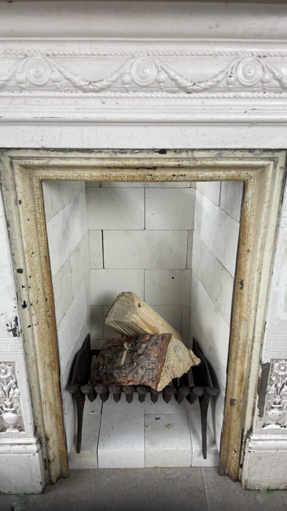 English Antique Cast-Iron Fireplace with Original Patina