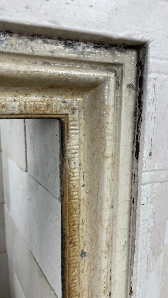 English Antique Cast-Iron Fireplace with Original Patina