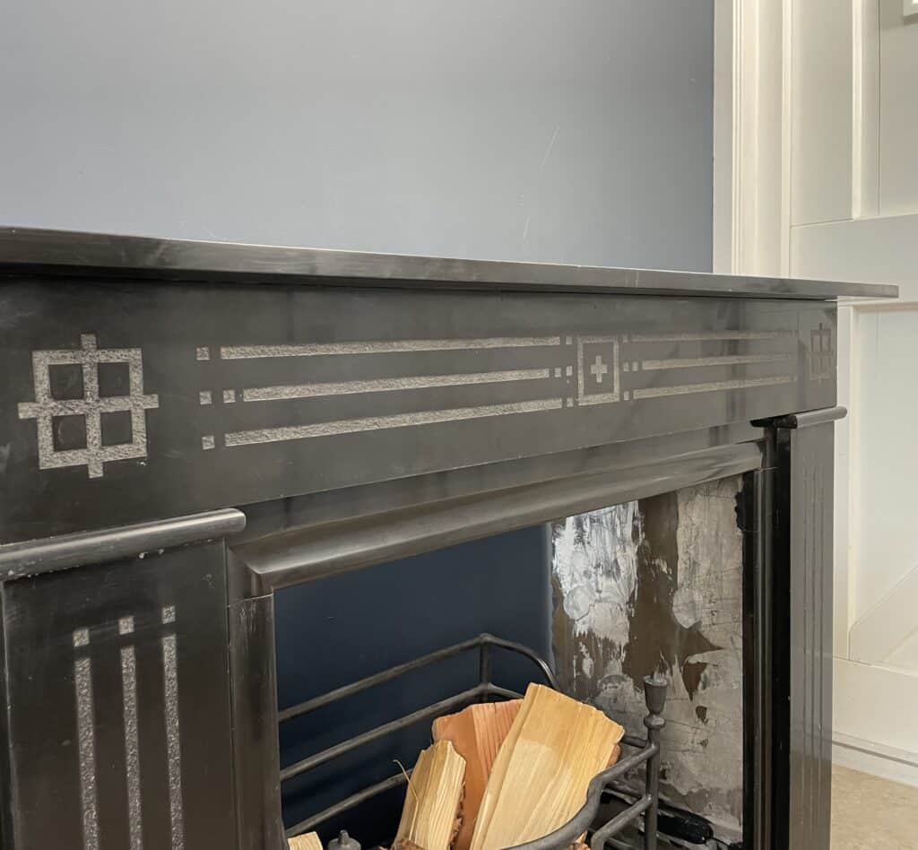 Antique Black Marble Etched Circular Fireplace