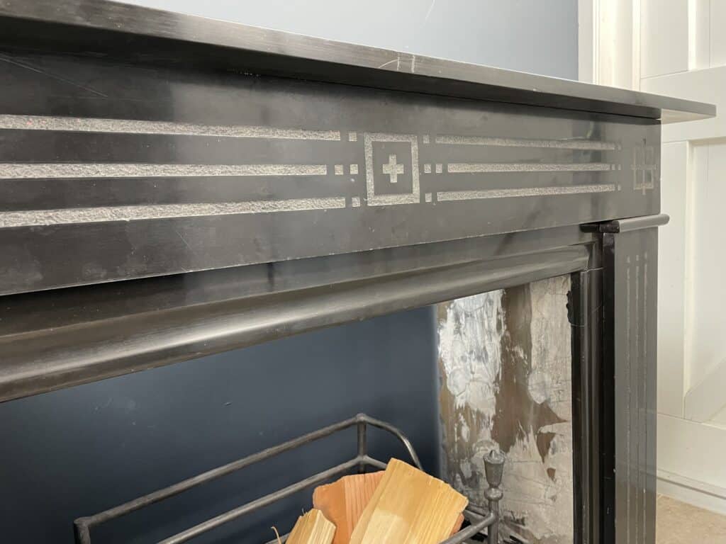 Antique Black Marble Etched Circular Fireplace