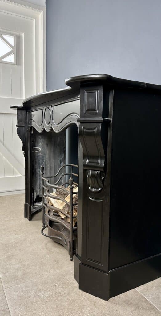 Antique 45-Degree Black Marble Circular Fireplace