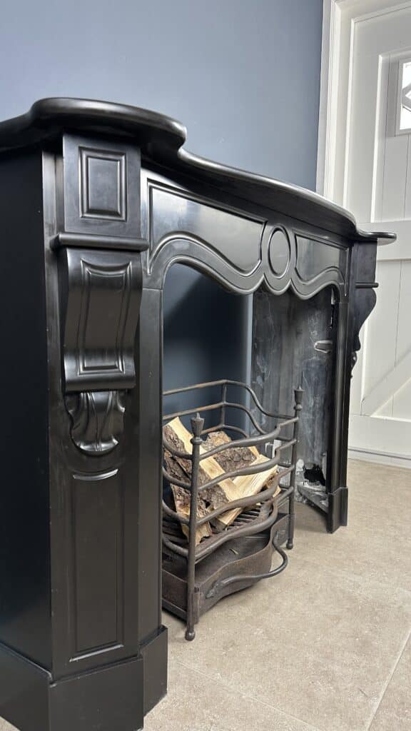 Antique 45-Degree Black Marble Circular Fireplace