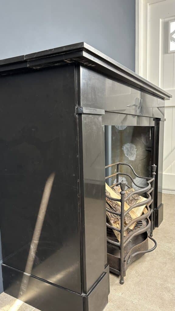 Antique Black Circular Flat Fireplace in Noir de Mazy Marble