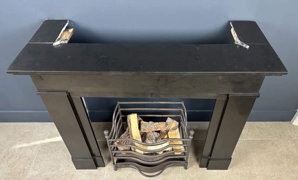 Antique Black Circular Flat Fireplace in Noir de Mazy Marble