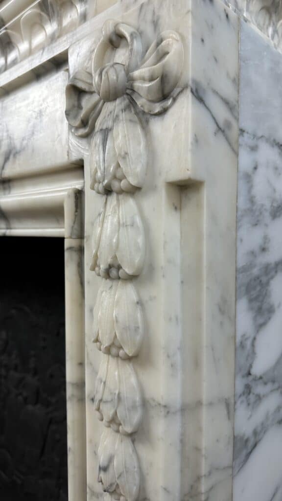 Beautiful Antique French Front Fireplace: A Masterpiece of Refinement and Craftsmanship