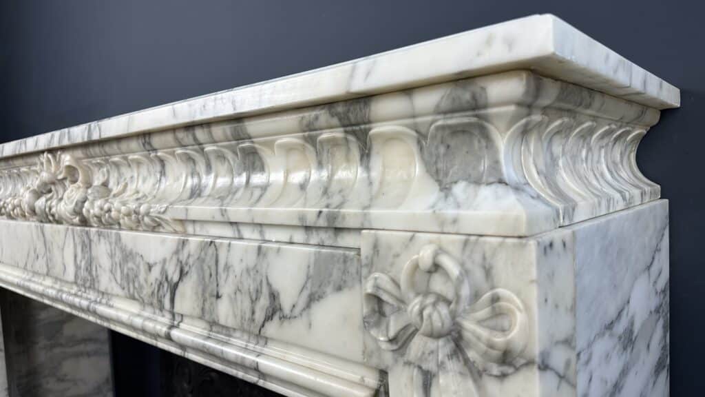 Beautiful Antique French Front Fireplace: A Masterpiece of Refinement and Craftsmanship