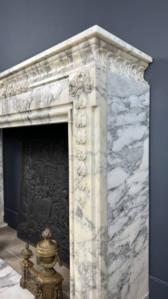 Beautiful Antique French Front Fireplace: A Masterpiece of Refinement and Craftsmanship