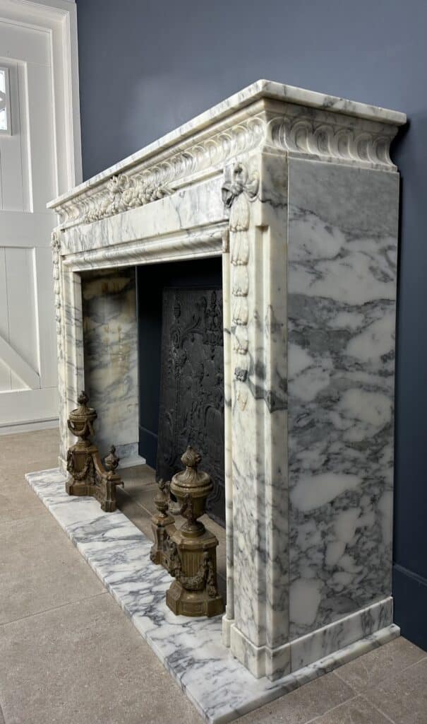 Beautiful Antique French Front Fireplace: A Masterpiece of Refinement and Craftsmanship