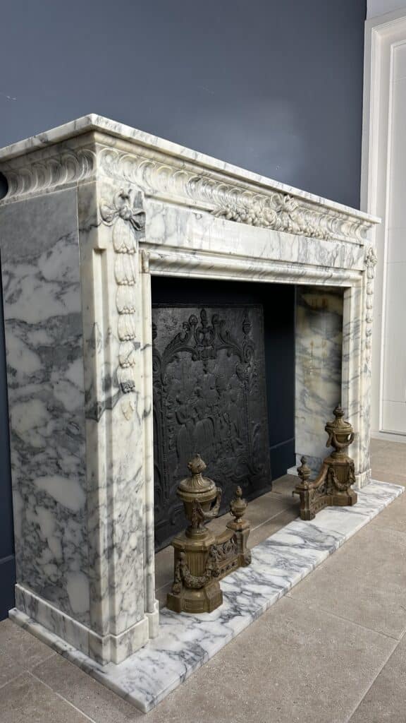 Beautiful Antique French Front Fireplace: A Masterpiece of Refinement and Craftsmanship
