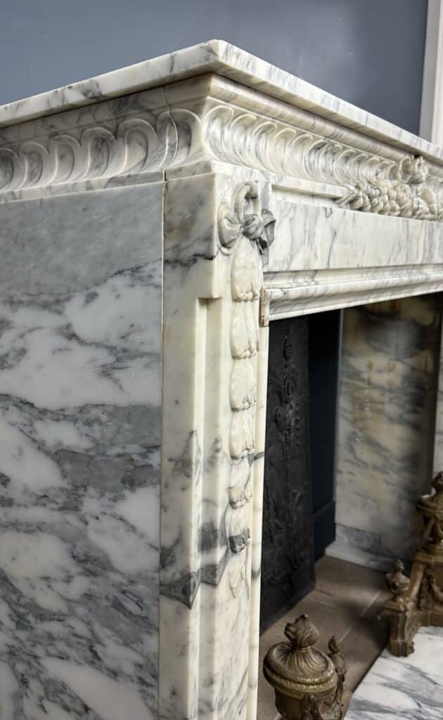 Beautiful Antique French Front Fireplace: A Masterpiece of Refinement and Craftsmanship