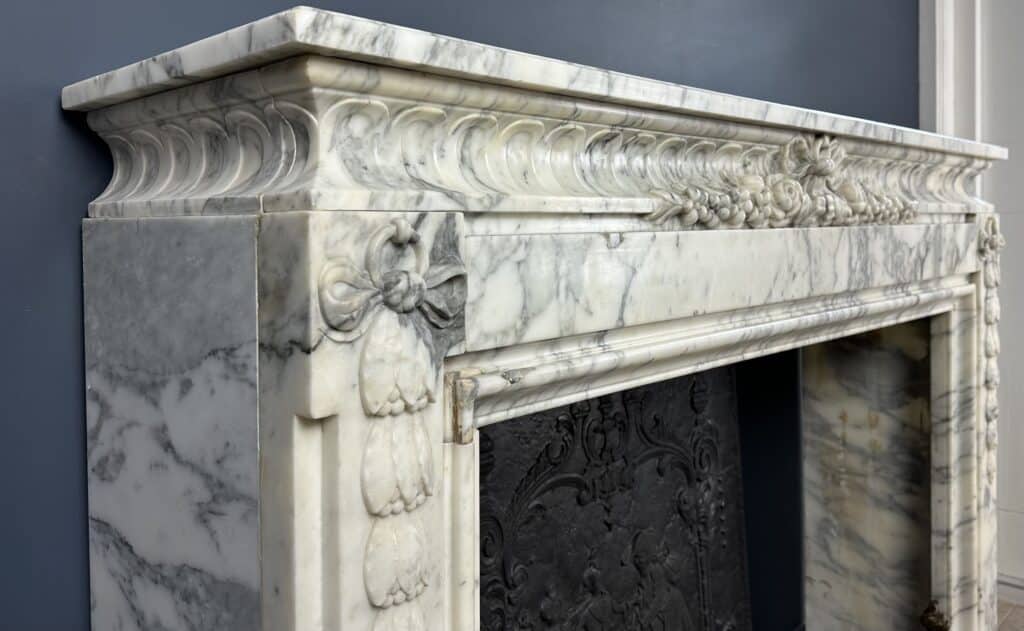 Beautiful Antique French Front Fireplace: A Masterpiece of Refinement and Craftsmanship