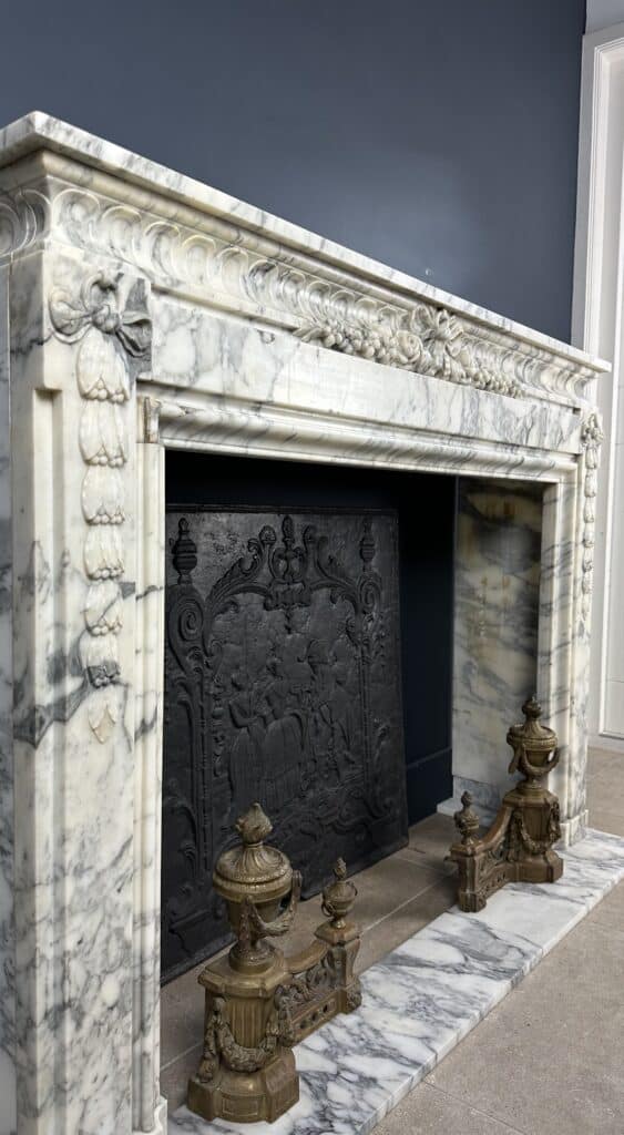 Beautiful Antique French Front Fireplace: A Masterpiece of Refinement and Craftsmanship