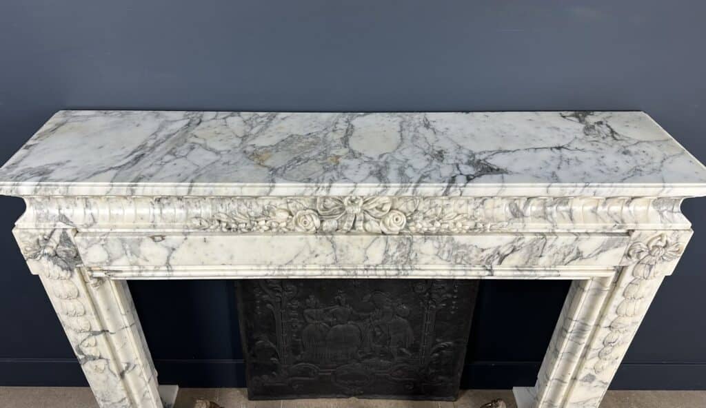 Beautiful Antique French Front Fireplace: A Masterpiece of Refinement and Craftsmanship