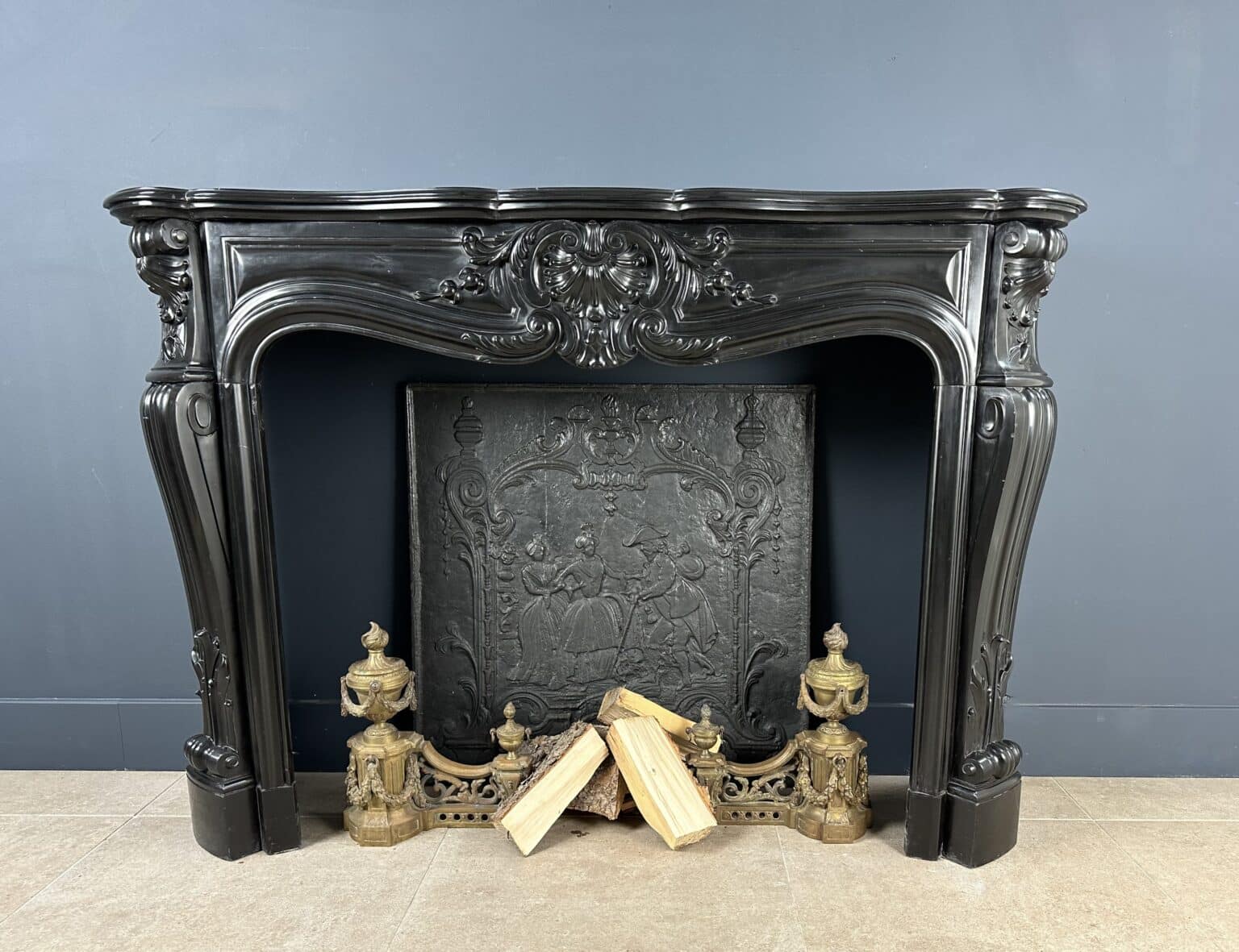 Refined Louis XV Style: Antique Marble Front Fireplace in Noir de Mazy Marble