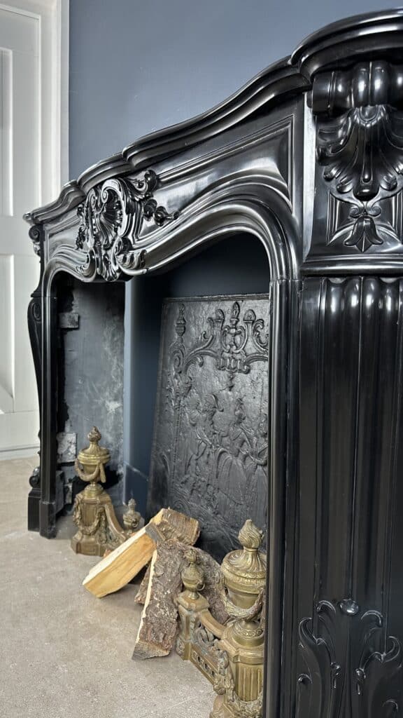 Refined Louis XV Style: Antique Marble Front Fireplace in Noir de Mazy Marble