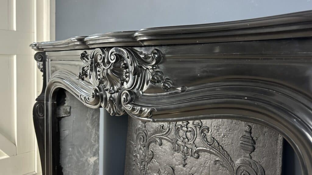 Refined Louis XV Style: Antique Marble Front Fireplace in Noir de Mazy Marble