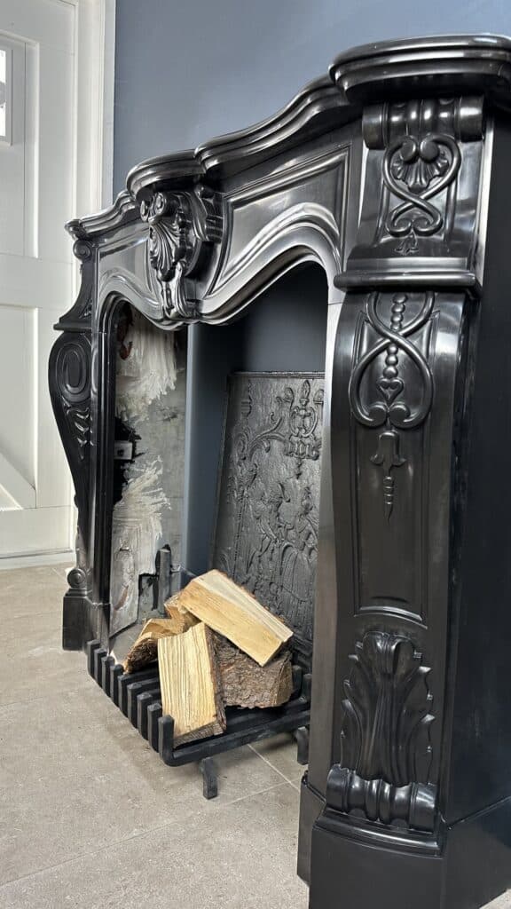Refined Splendor: Louis XV Style Noir de Mazy Antique Marble Front Fireplace