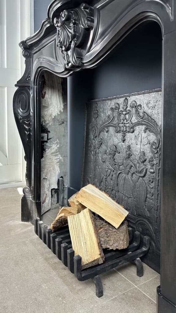 Refined Splendor: Louis XV Style Noir de Mazy Antique Marble Front Fireplace