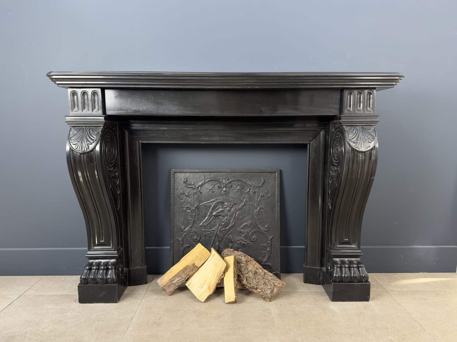 Magnificent Richly Decorated Front Fireplace in Noir de Mazy Black Marble
