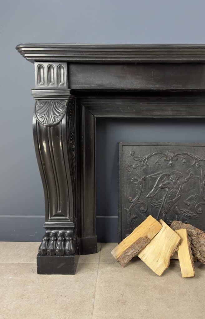 Magnificent Richly Decorated Front Fireplace in Noir de Mazy Black Marble