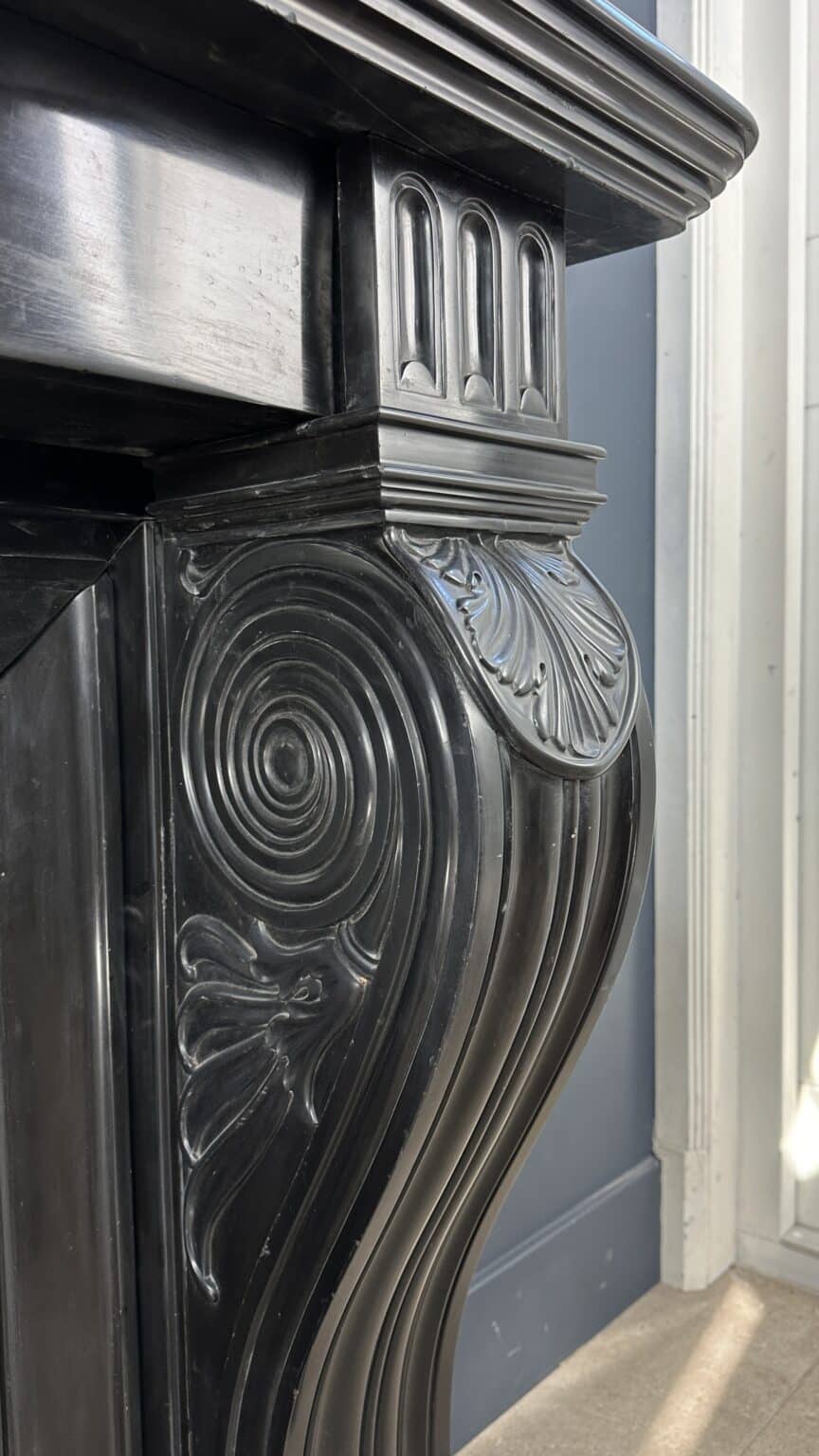 Magnificent Richly Decorated Front Fireplace in Noir de Mazy Black Marble — detail 2