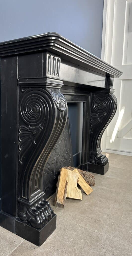 Magnificent Richly Decorated Front Fireplace in Noir de Mazy Black Marble