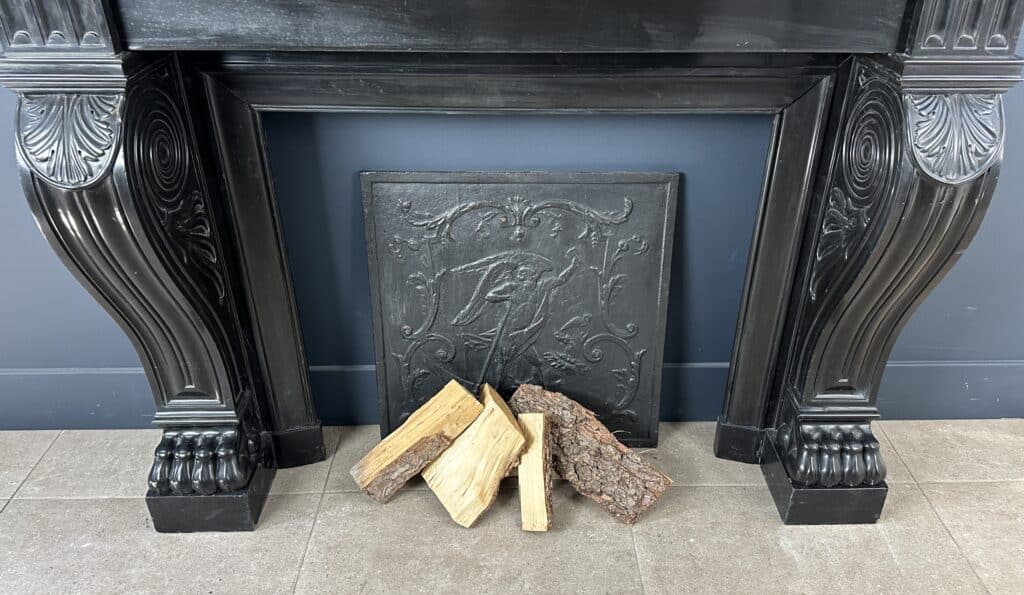 Magnificent Richly Decorated Front Fireplace in Noir de Mazy Black Marble