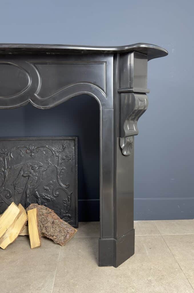 Antique Black Marble Fireplace with Angled Consoles