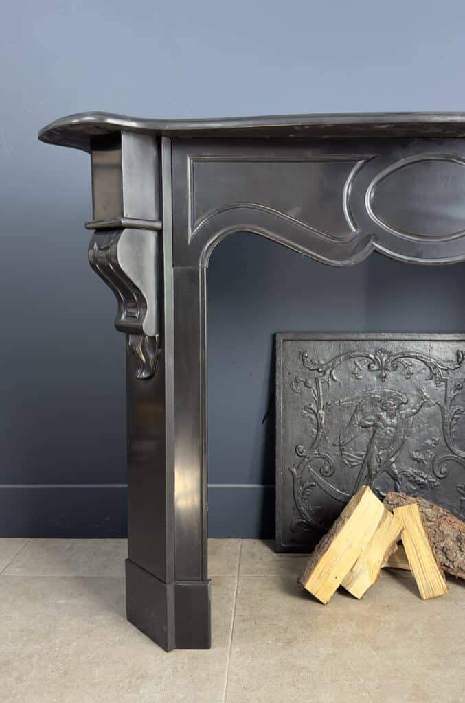 Antique Black Marble Fireplace with Angled Consoles