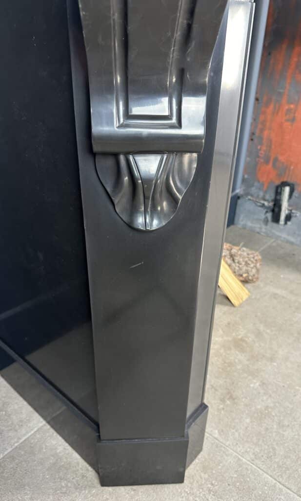 Antique Black Marble Fireplace with Angled Consoles