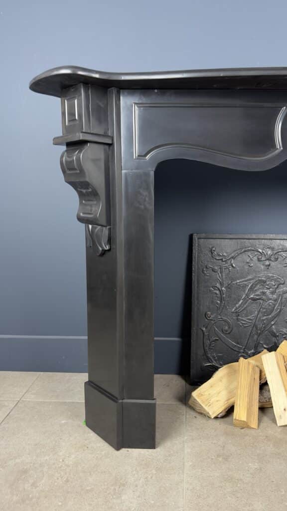 Antique Black Marble Fireplace with Angled Consoles