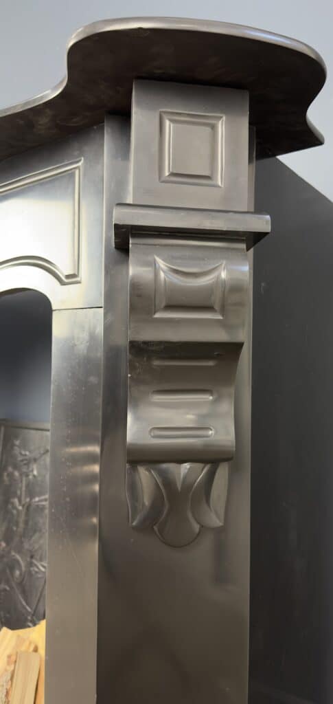 Antique Black Marble Fireplace with Angled Consoles